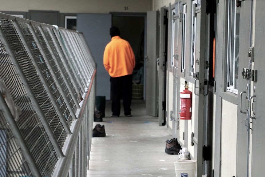 Risdon prison interior walkway with unidentified inmate.