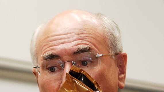 John Howard officially opens a coffee factory