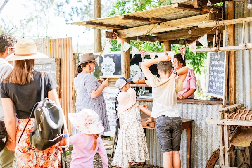 People at a market stall