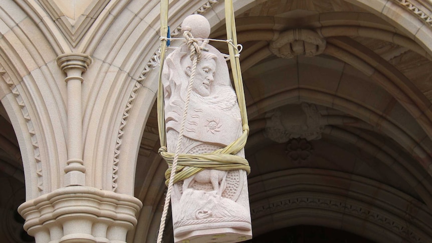 Wisdom being lifted into place at St John's Cathedral in Brisbane