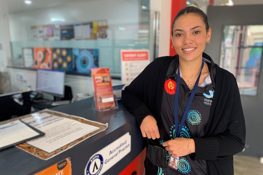 A young Aboriginal woman in a medical setting. 