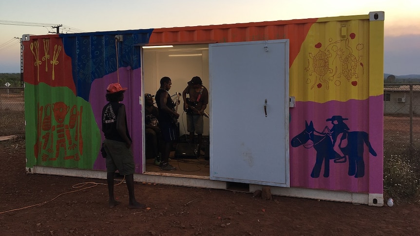 The band practices inside a converted shipping container in Arnhem Land.