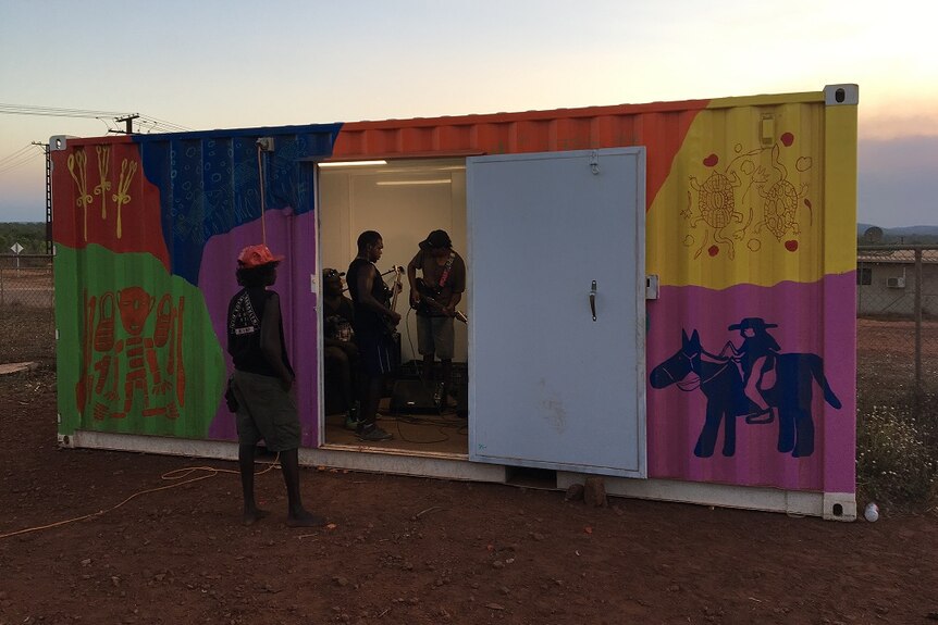 The band practices inside a converted shipping container in Arnhem Land.
