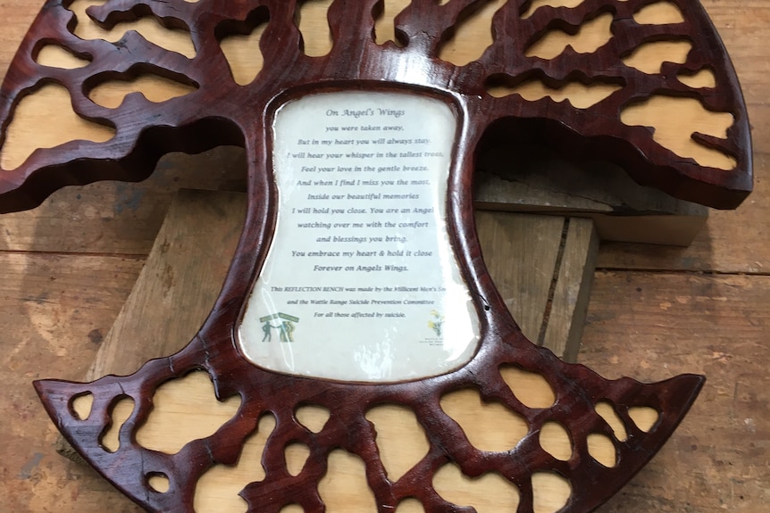 round plaque with words