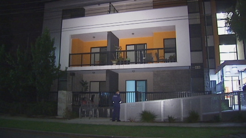A man died after falling from a second-floor balcony.