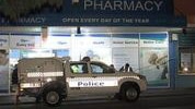 Police are searching for two men who used a firearm to rob a chemist in Wembley.
