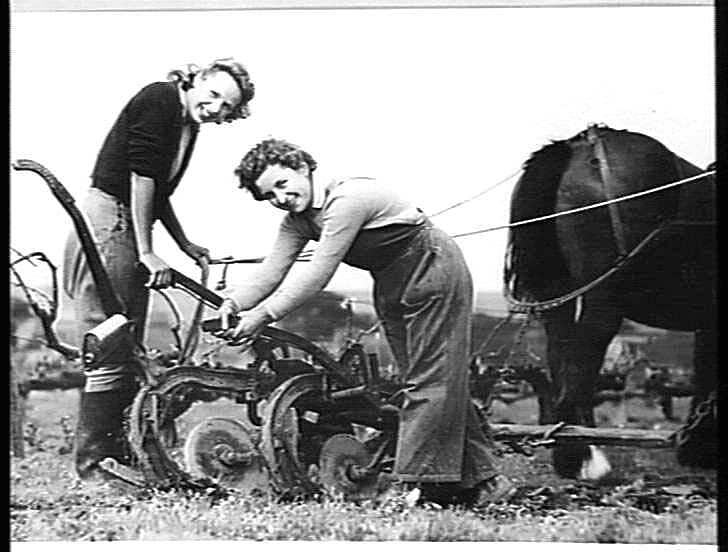 Two &#x27;land girls&#x27; with a furrow in 1942. 