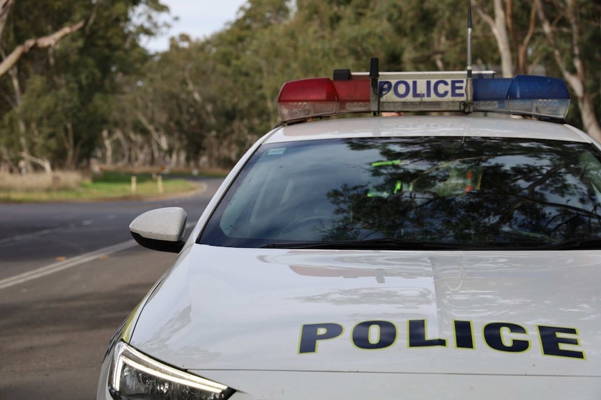 A police car on a rural South Australian road.