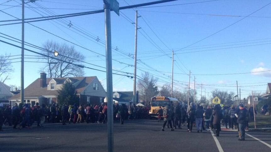 Students are evacuated from Fair Lawn High School in New Jersey following a bomb threat.