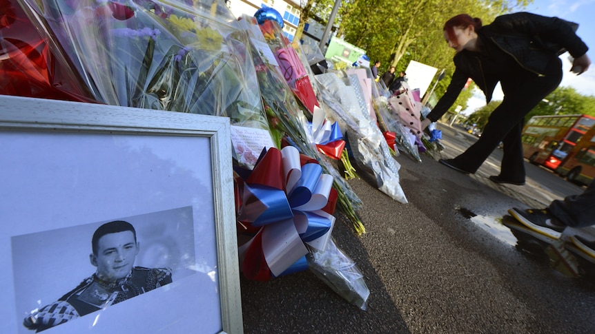 Mourners leave flowers for Drummer Lee Rigby, victim of London attack