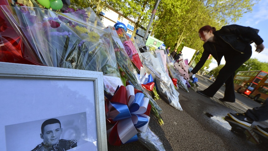 Mourners leave flowers for Drummer Lee Rigby.