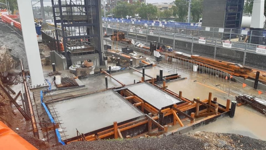 a construction site full of rainwater