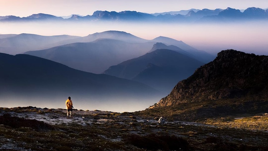 Fog and sunrise over a mountains.