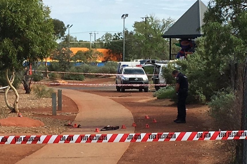 A taped off crime scene on the Stuart Highway in Alice Springs