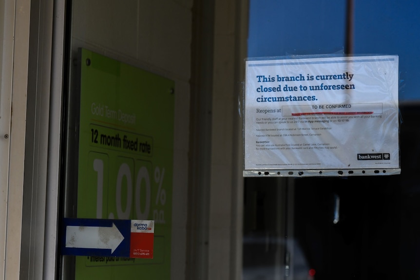 A close-up of a closed sign on a Bankwest branch in Carnarvon.