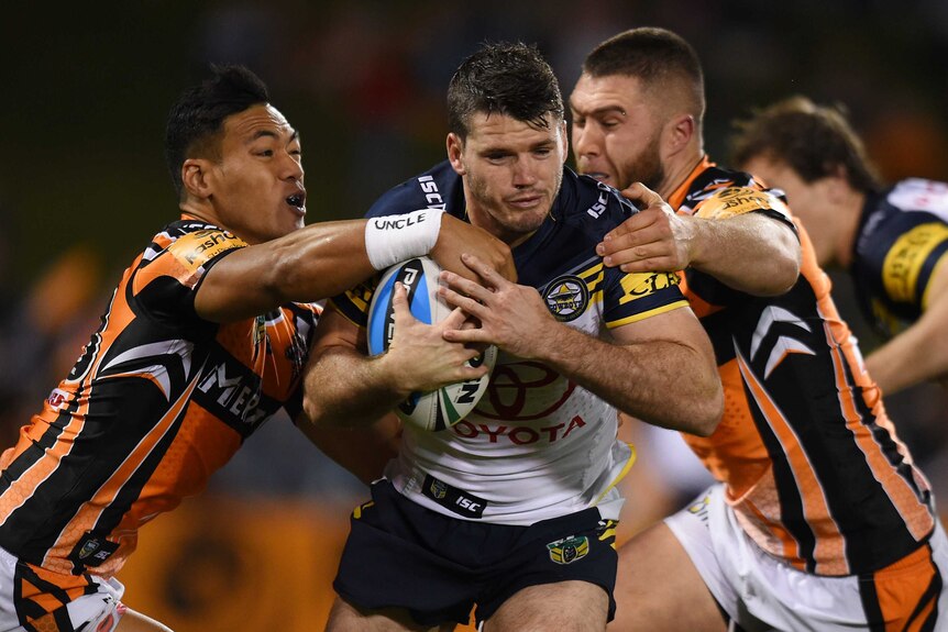 North Queensland's Lachlan Coote takes it up against Wests Tigers