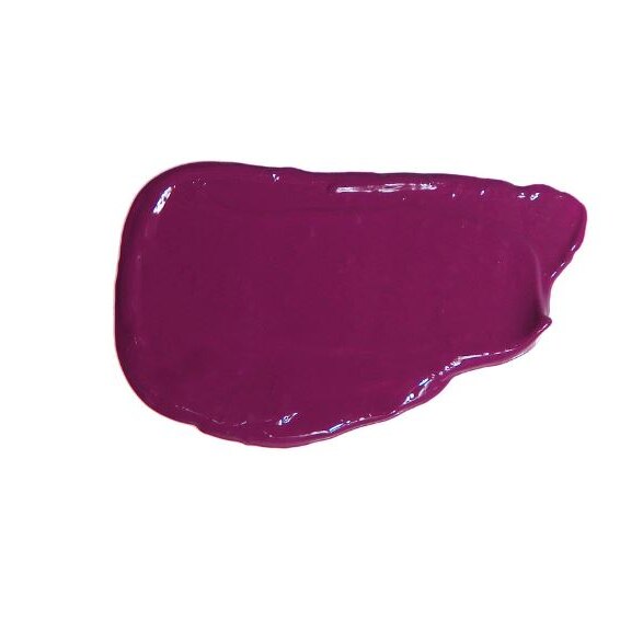 Photo of a smudge of purple makeup on a white background 