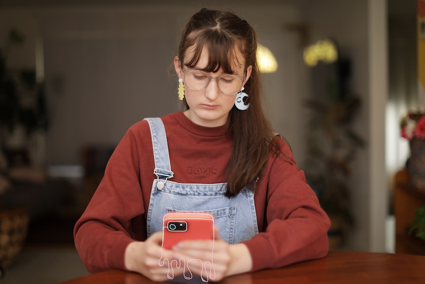 Claire holds her phone and looks down at it. There is an illustration of an outline on the phone and slime coming from it.