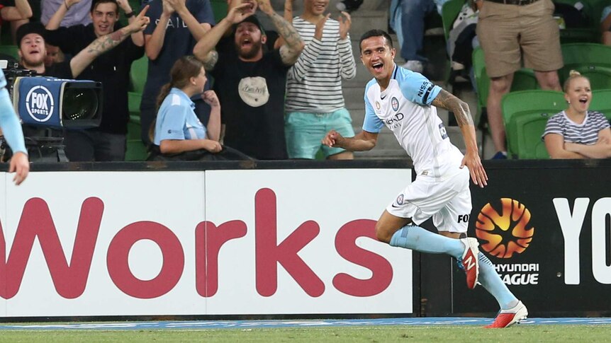 Tim Cahill celebrates one of his goals against Central Coast