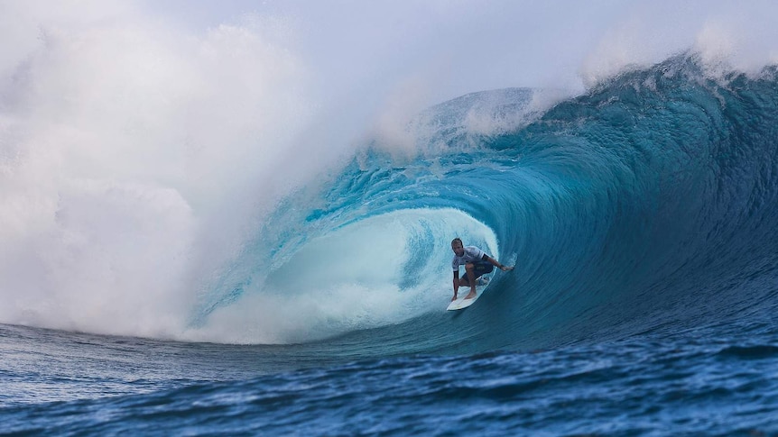 Josh Kerr surfing in Tahiti