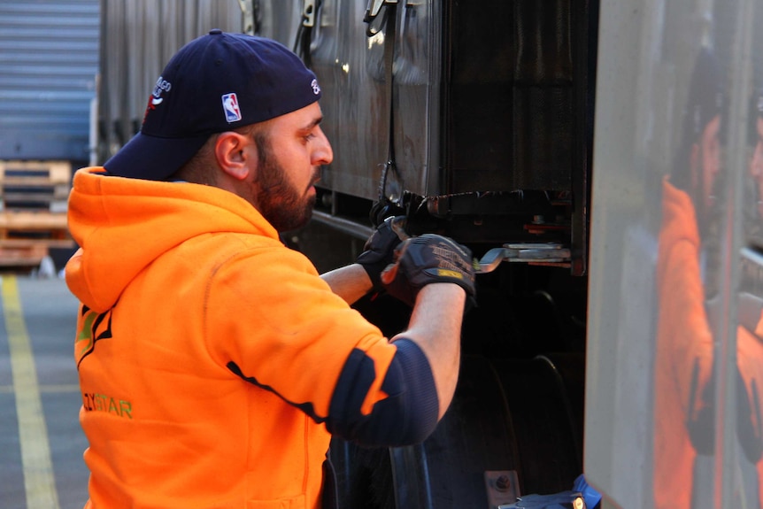 Truck driver Carem Mehrez working