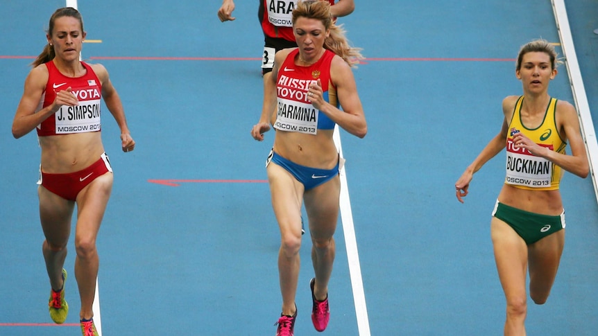 Australia's Zoe Buckman (R) qualifies for the semis of the women's 1500 metres at the world titles.