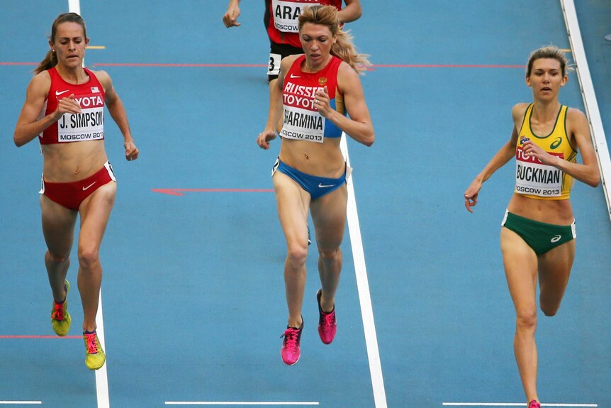 Australia's Zoe Buckman (R) qualifies for the semis of the women's 1500 metres at the world titles.