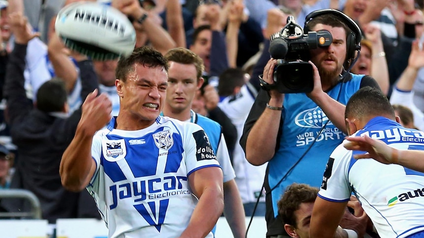 Sam Perrett of the Bulldogs celebrates after scoring a try during the 2012 NRL grand final.