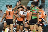 Wests Tigers celebrate a try against South Sydney