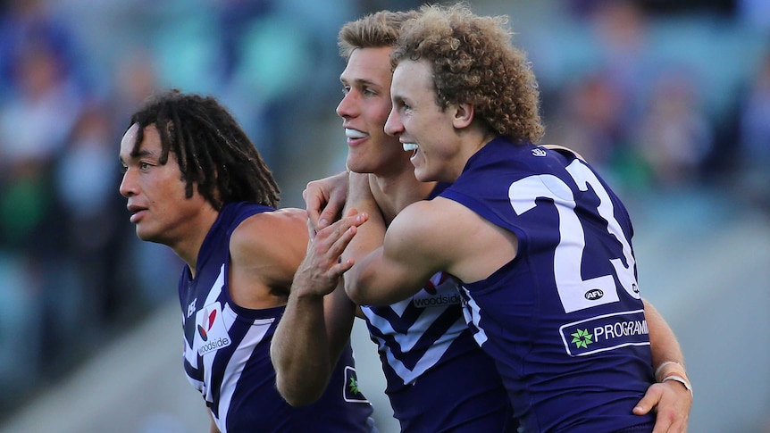 The Dockers celebrate another goal against the Giants