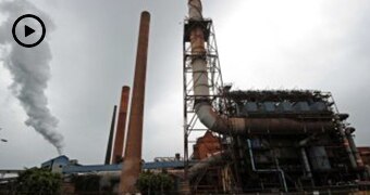 Wide shot of a disused blast furnace at a factory.