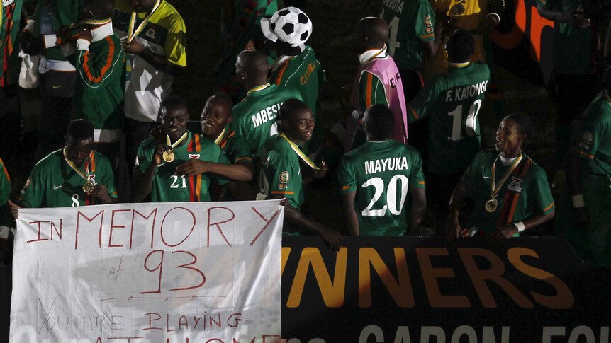 Zambia players celebrate their African Cup of Nations final win over Ivory Coast in February 2012.