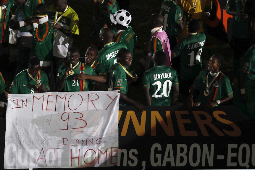 Zambia players celebrate their African Cup of Nations final win over Ivory Coast in February 2012.