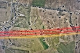 Aerial shot of farm with transmission lines marked in red