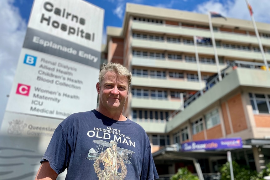 Christian McDonald stands outside Cairns hospital.