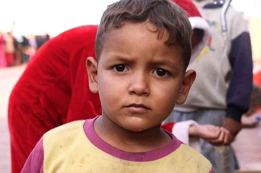 A young boy among refugees fleeing Mosul, Iraq