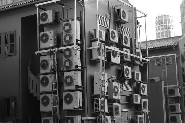 Air conditioners attached to a building.