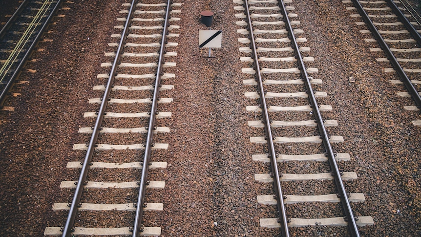 Two train tracks running parallel.