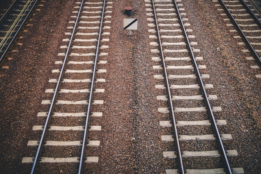 Two train tracks running parallel.