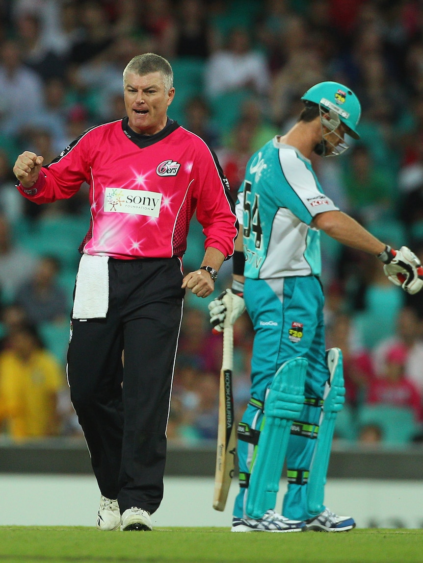 Stuart MacGill rolled back the years with a starring role in the Sixers' win over Brisbane.