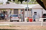 A car stopped at a drive-through testing clinic at the Katherine District Hospital.