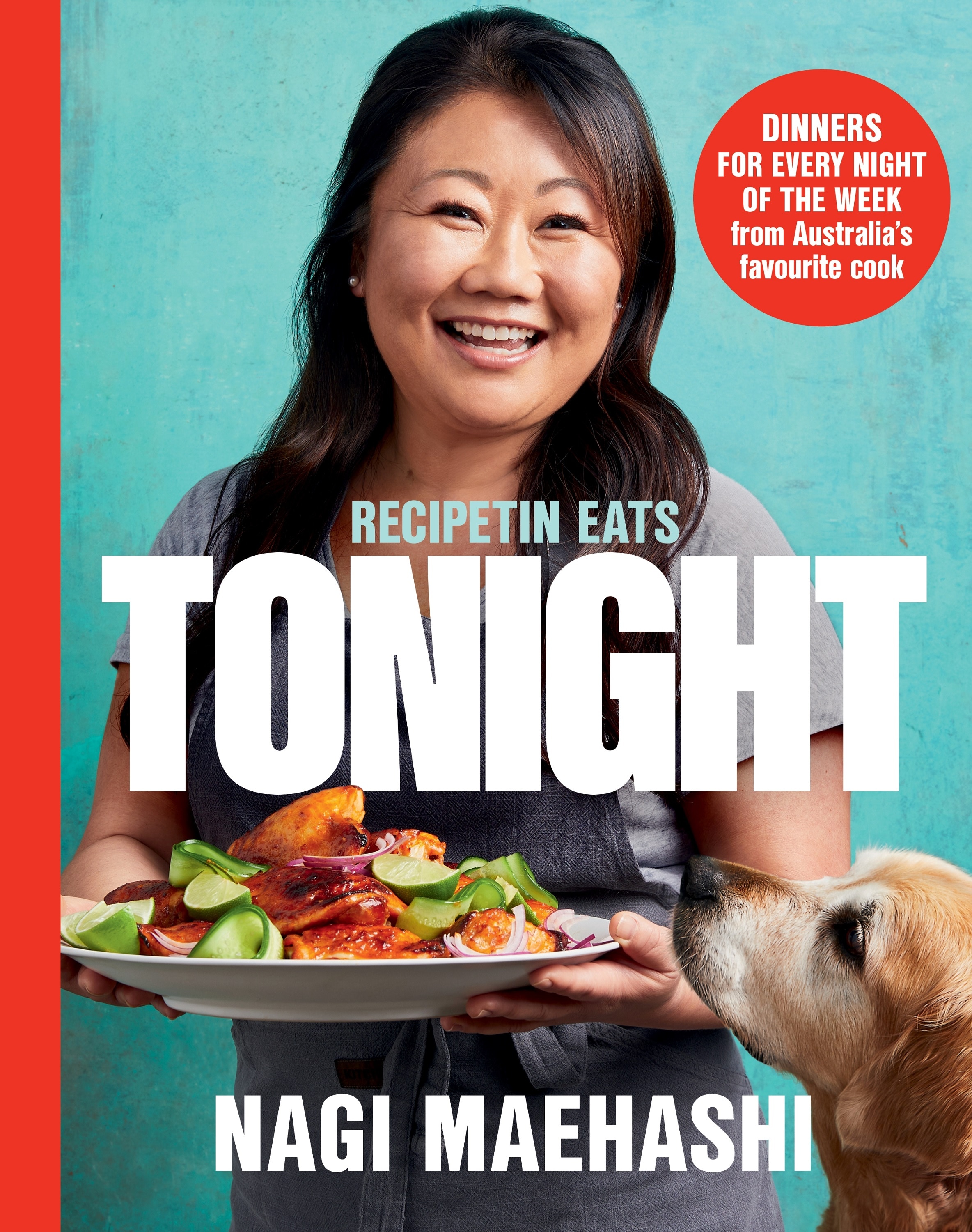 A book cover showing a smiling woman holding a plate of food and a golden dog staring at her