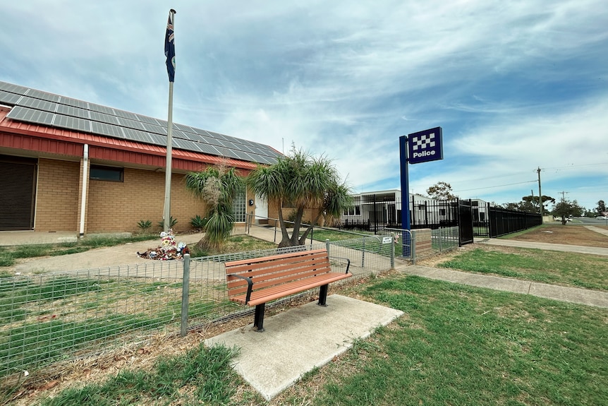 A street view of a police station.