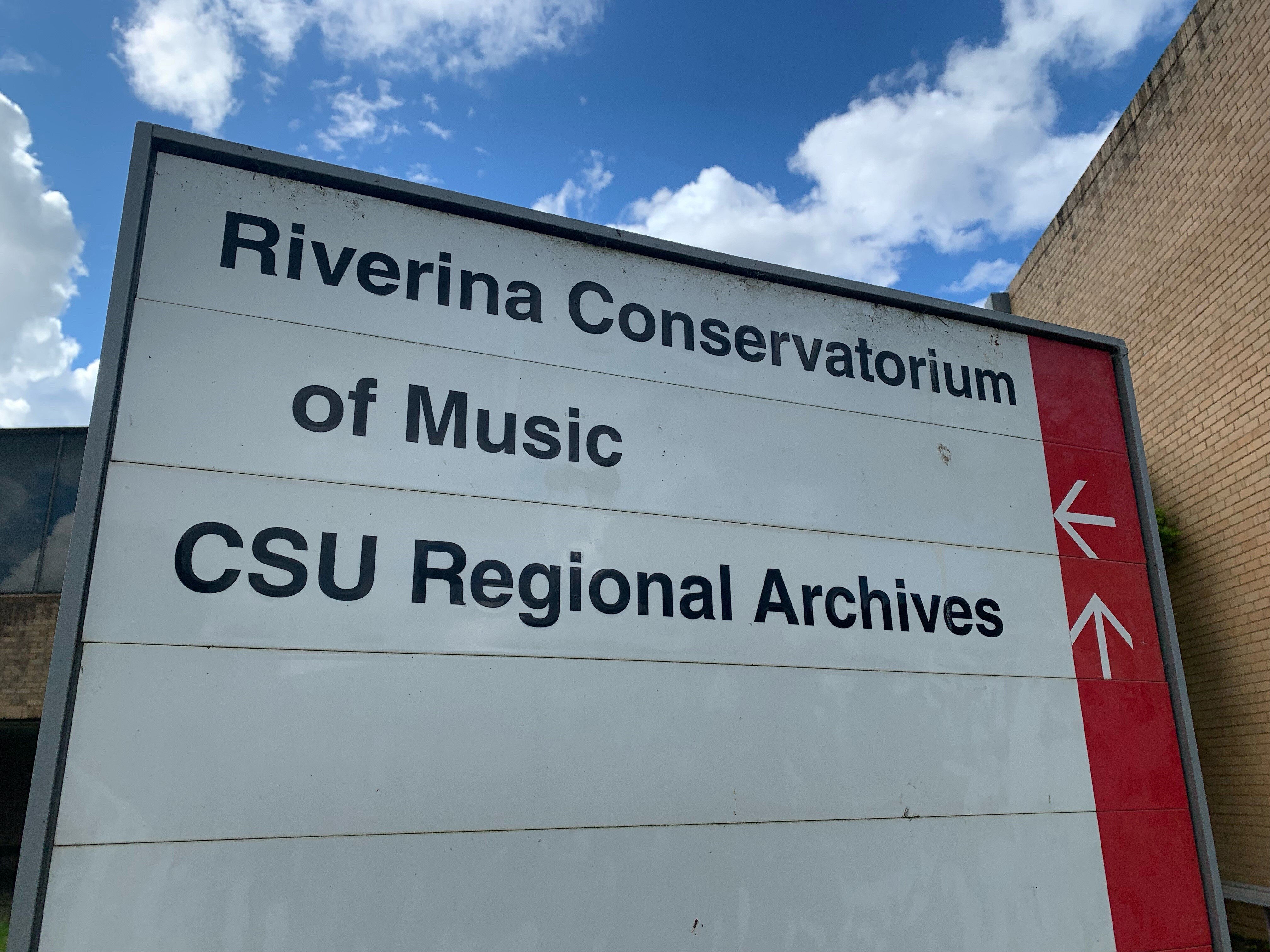 A sign reads "Riverina Conservatorium of Music, CSU Regional Archives"