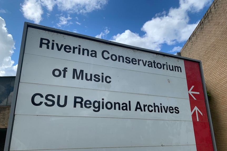A sign reads "Riverina Conservatorium of Music, CSU Regional Archives"