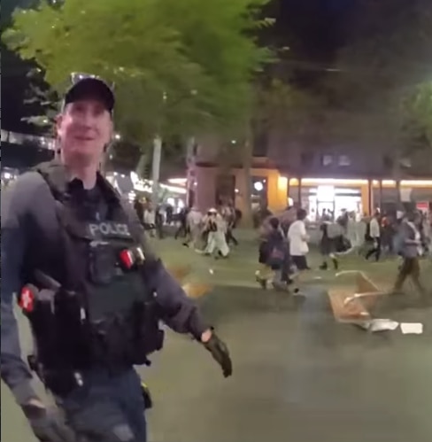 'I punched him in the head': Body-cam footage from Town Hall protest emerges