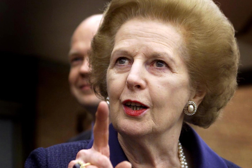 Margaret Thatcher answers journalists questions.