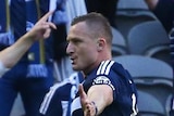 Berisha celebrates in front of Victory fans