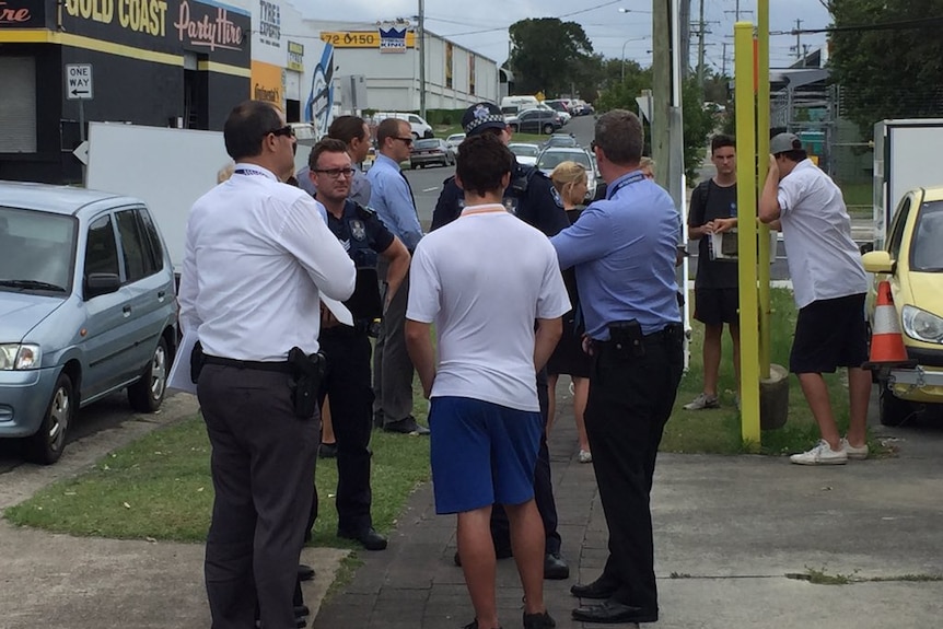 Gold Coast police on the scene of a reported stabbing