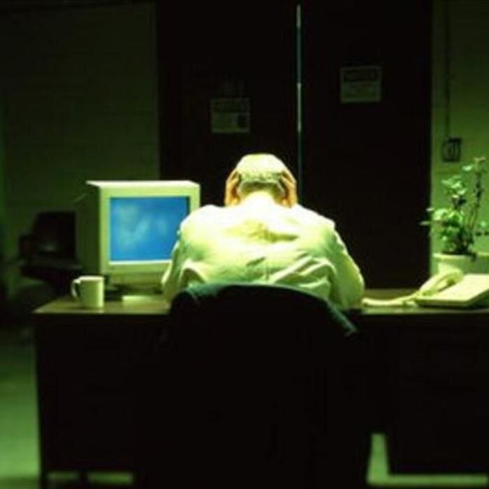 Man sits at a desk